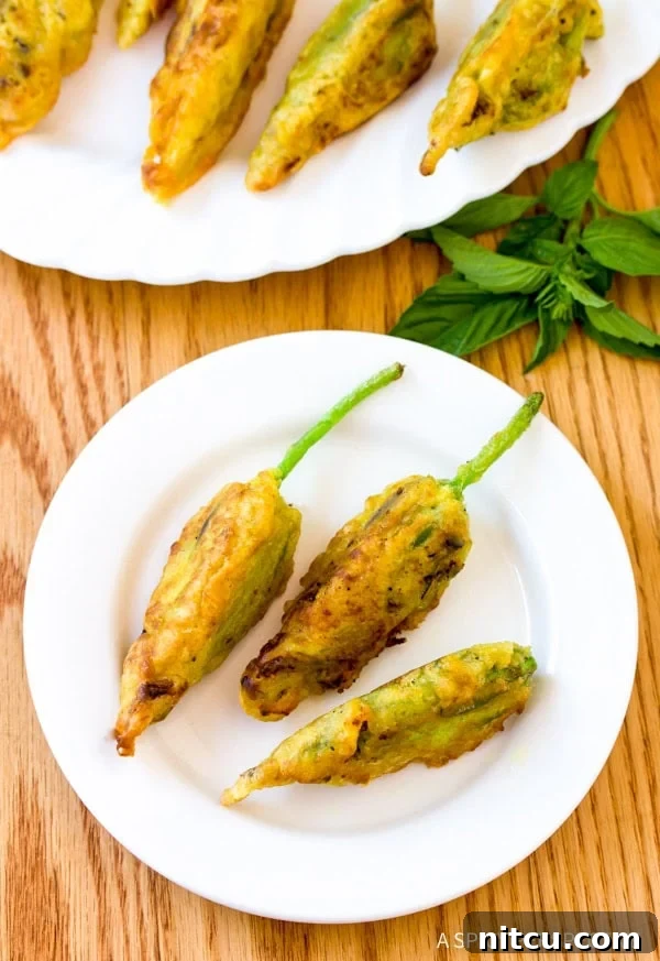 Simple Market Stuffed Squash Blossoms Recipe, showing the golden-fried blossoms arranged beautifully.