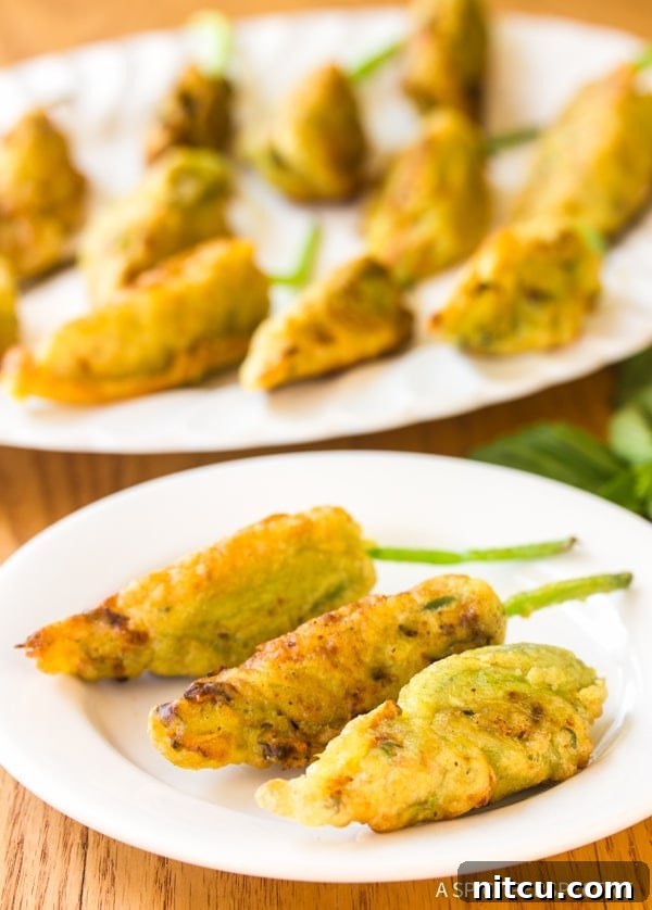 Crispy Market Stuffed Squash Blossoms Recipe, close-up of the perfectly fried appetizer.