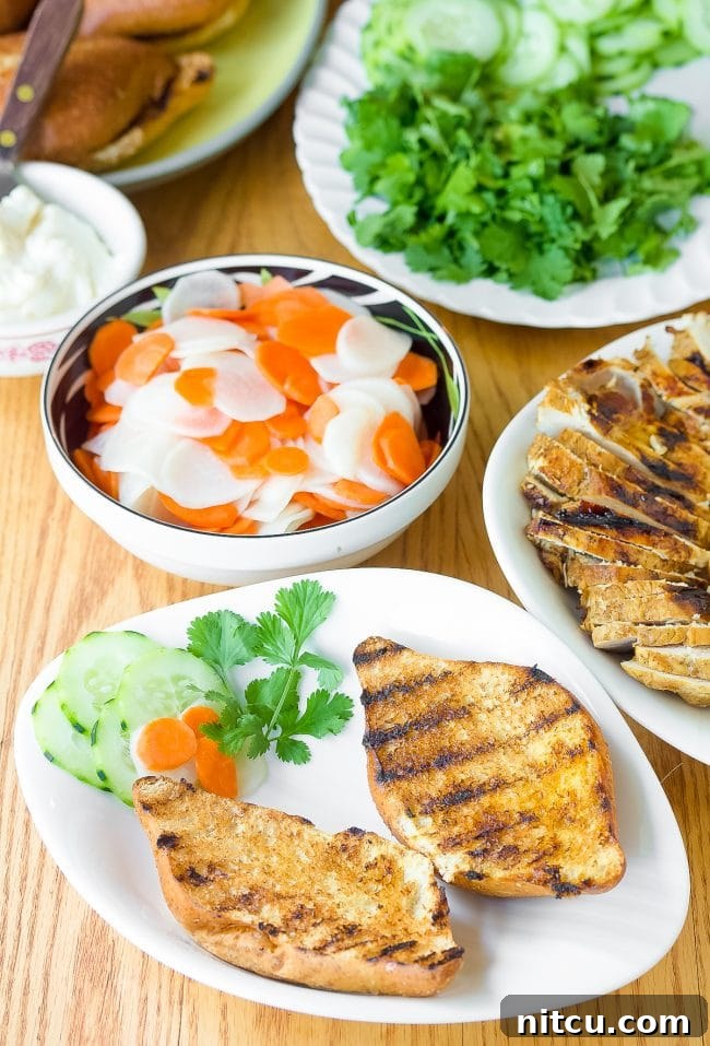 Banh Mi sandwich recipe with grilled bread on plates, ready for toppings