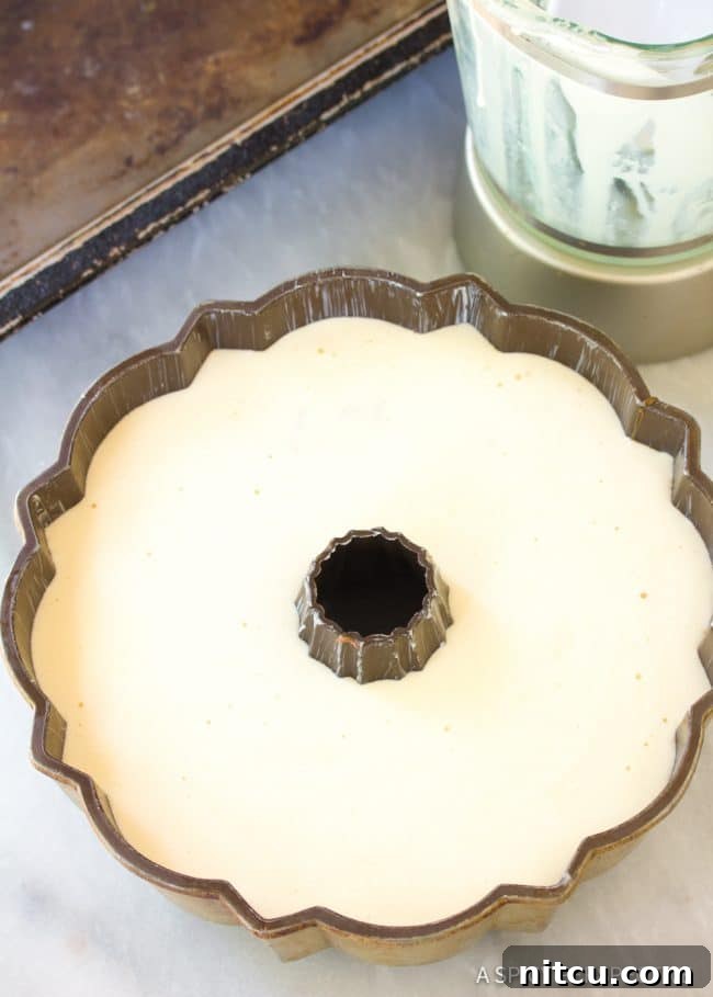 Chocoflan baking in a water bath (Bain Marie) in the oven.