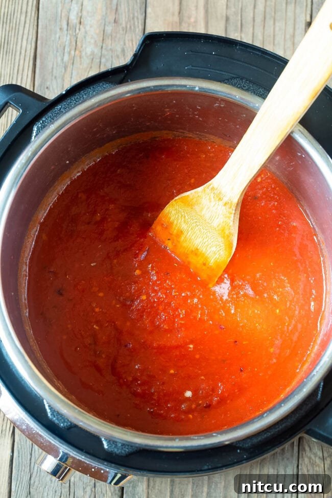 Tomato sauce cooking in an instant pot. 