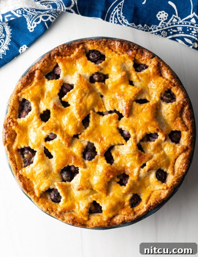 Juicy Fresh Blueberry Pie with a Flaky Almond Pie Crust