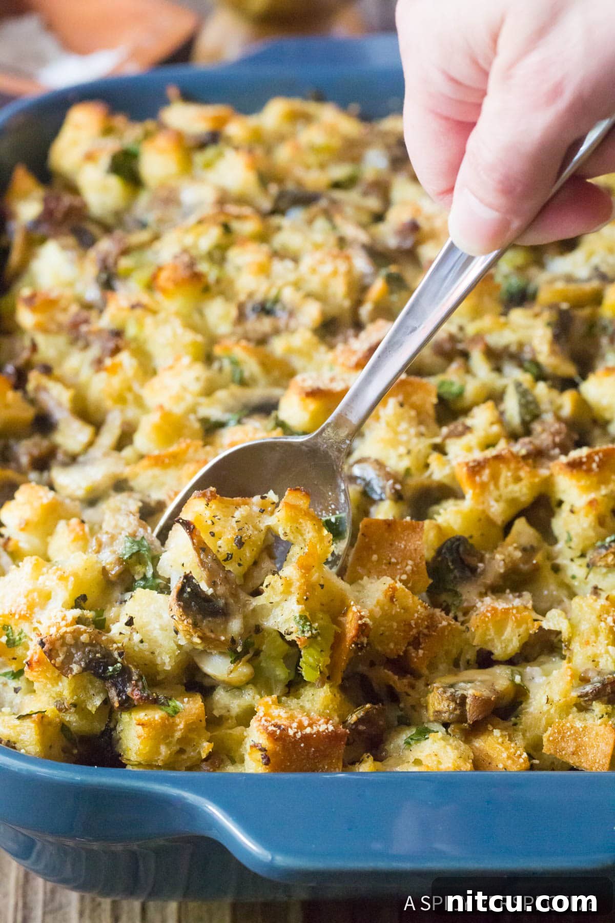 Mushroom Sausage Stuffing - close up shot in blue baking dish