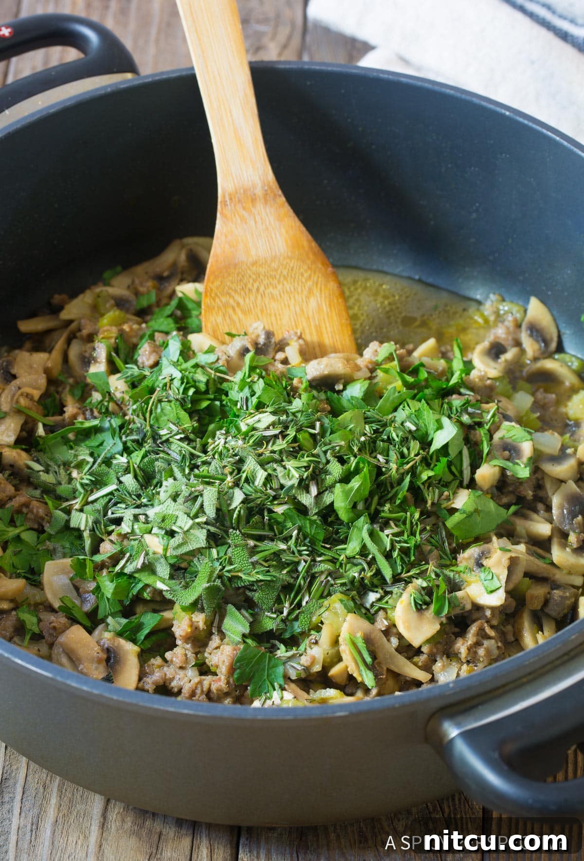 Adding fresh herbs to Thanksgiving stuffing