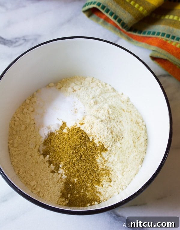 A bowl filled with dry ingredients for the masa shell, perfectly measured and ready for mixing.