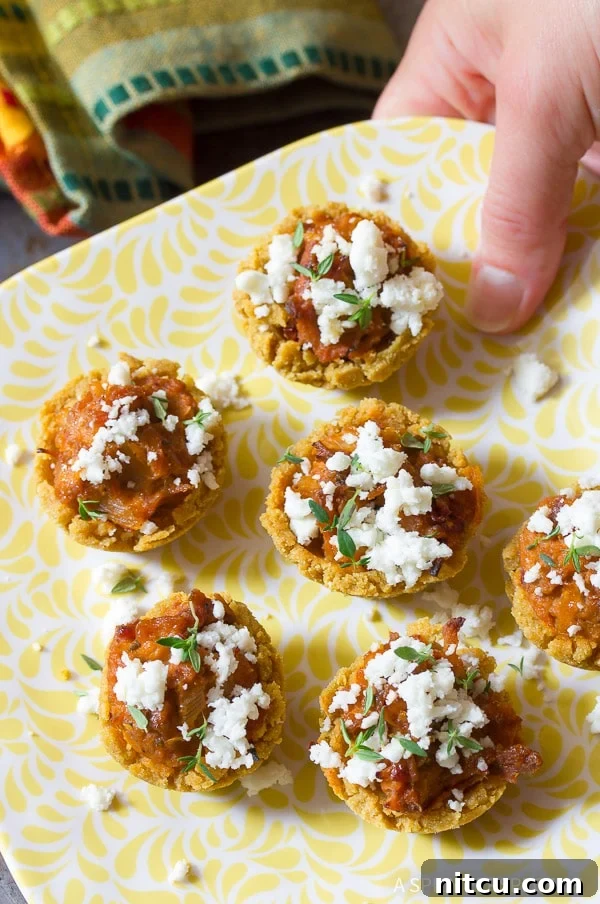 A close-up shot of small appetizers arranged on a vibrant yellow plate, ready for serving.
