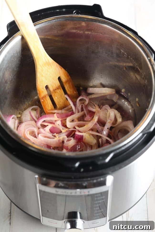 Preparation step: Beef chuck roast ready for the Instant Pot, showing ingredients arranged.