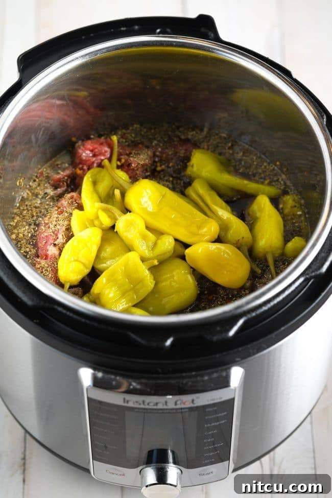 Instant Pot set to pressure cook for Italian Beef recipe, lid secured.