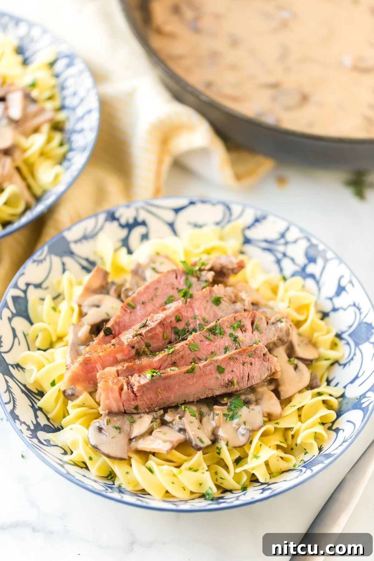 Simple Beef Stroganoff Recipe with Butter Noodles, featuring tender steak in a rich sauce.