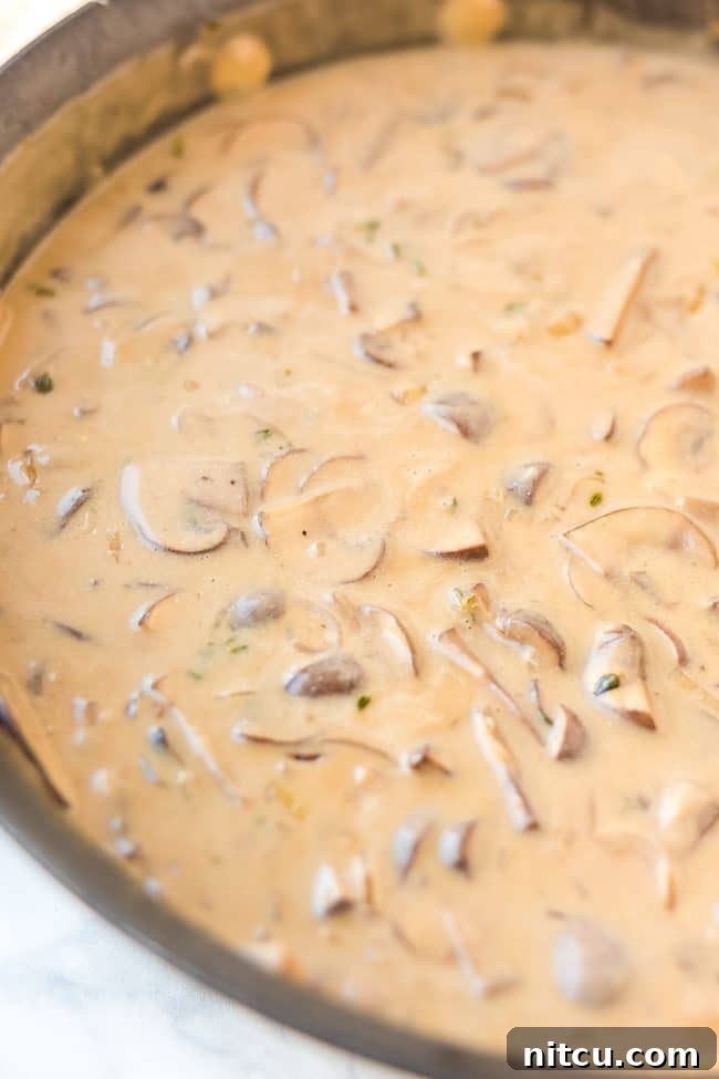 Combining steak and sauce for the ultimate Beef Stroganoff.