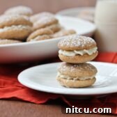 Beautifully arranged Chai Latte Sandwich Cookies dusted with powdered sugar