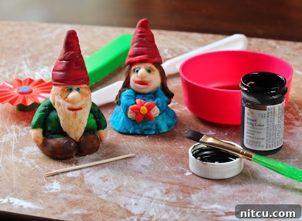 Painted fondant garden gnomes. 
