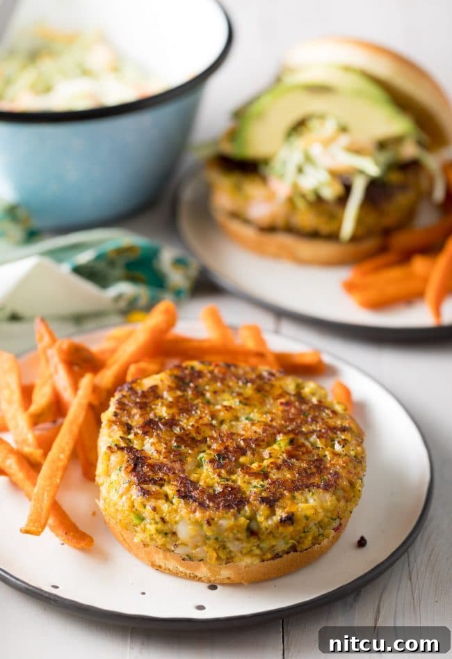 Shrimp patty placed on a hamburger bun, ready for toppings
