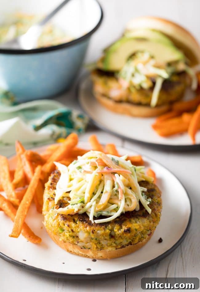 Fully assembled Island Burgers with mango slaw and avocado