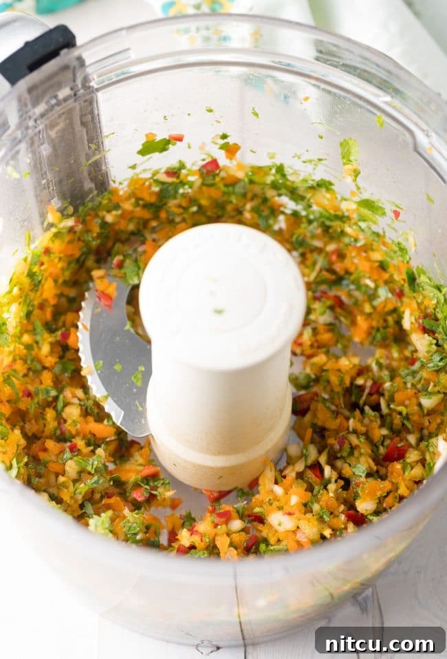 Finely chopped vegetables and shrimp for the burger patties