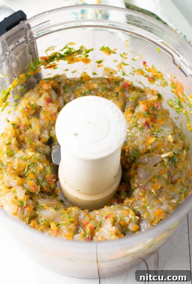 How to prepare the Caribbean Shrimp Burger mixture in a food processor
