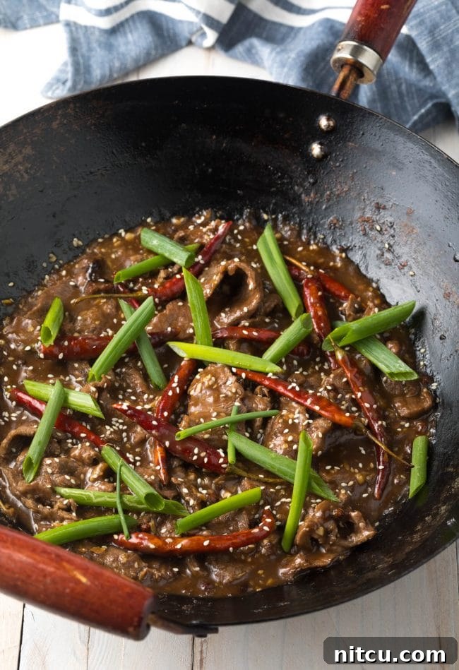 Added veggies to the pan with the szechuan beef and peppers