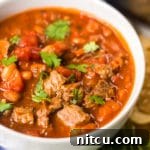 The Best Steak Chili Recipe Ever, featuring beef and beer – perfect for fall and tailgating.