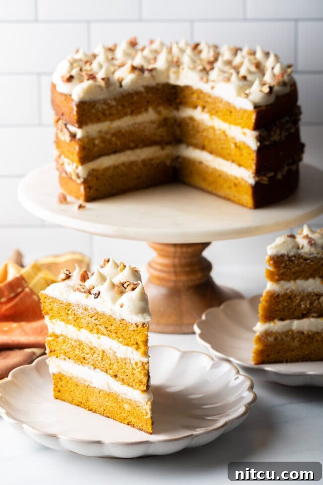 Pumpkin Cake Recipe on plates and cake stand.
