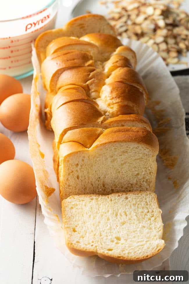 A loaf of brioche bread that's sliced.