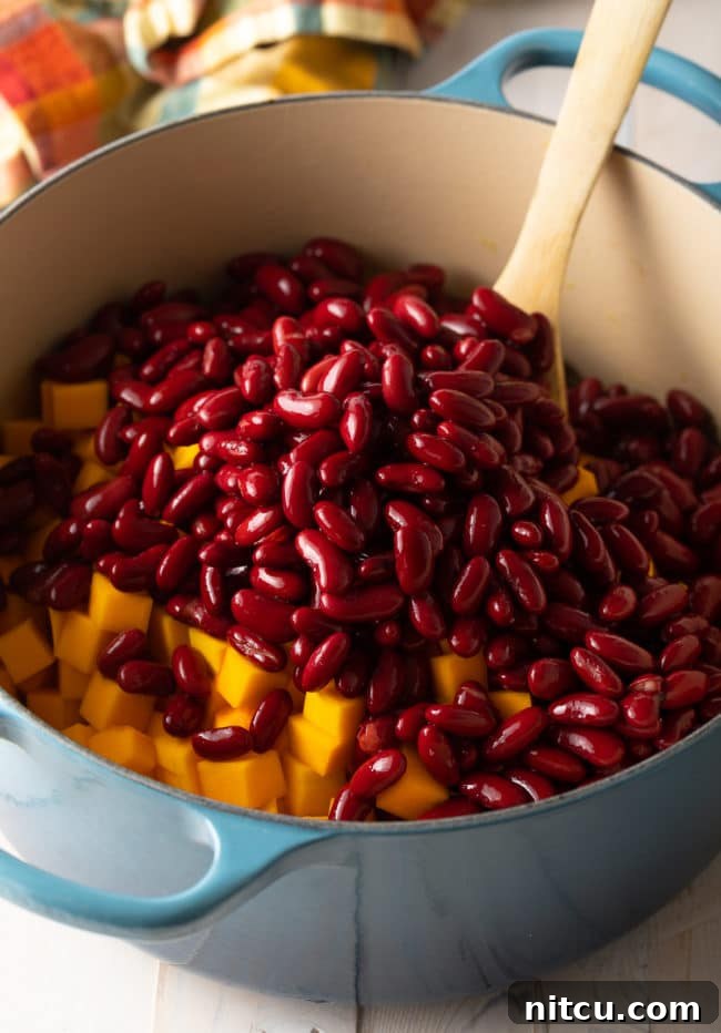 A close-up shot of a rustic bowl of Vegetarian Chili, perfect for a cold weather meal.