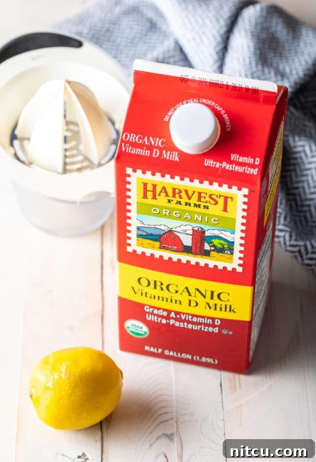 The two essential ingredients for homemade buttermilk: fresh milk and bright yellow lemons.