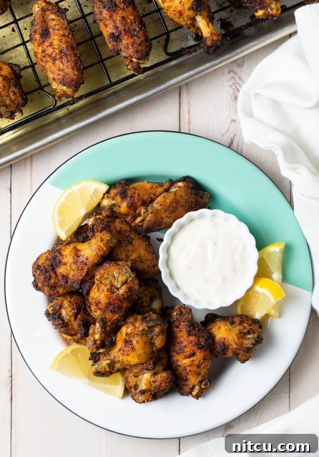 Platter of delicious baked lemon pepper wings