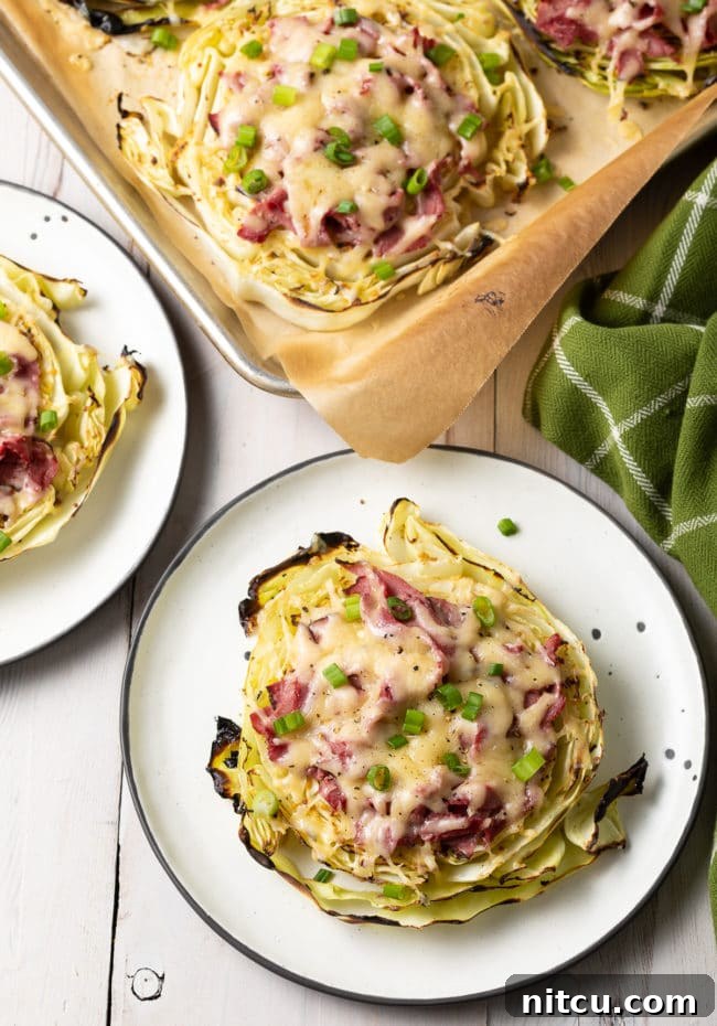 Delicious Irish Roasted Cabbage Low Carb Pizza with corned beef and Dubliner cheese on roasted cabbage steaks.