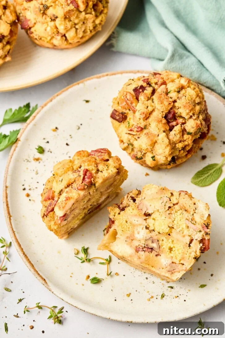 Thanksgiving stuffing mixture neatly baked in a set of muffin pans, ready to be removed and served