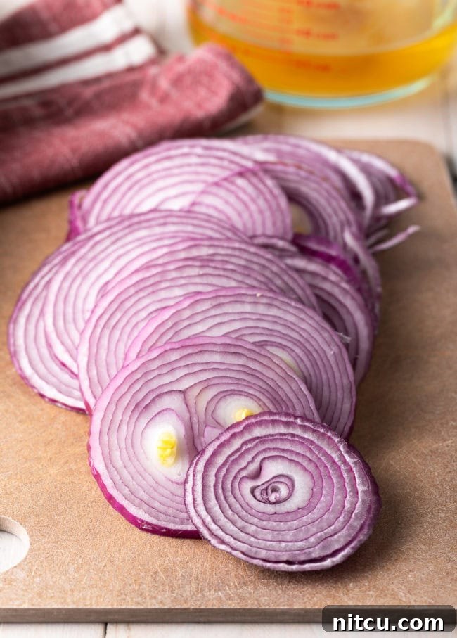 sliced onions on cutting board