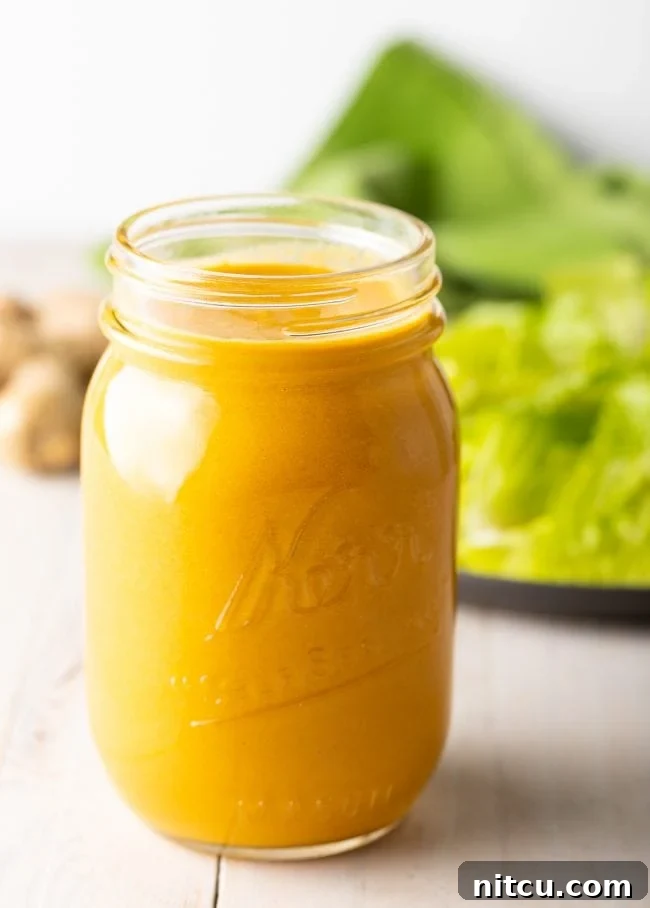 Japanese Ginger Dressing - Hibachi salad dressing in a jar. A close-up of the homemade Japanese Ginger Dressing, ready for storage or serving.