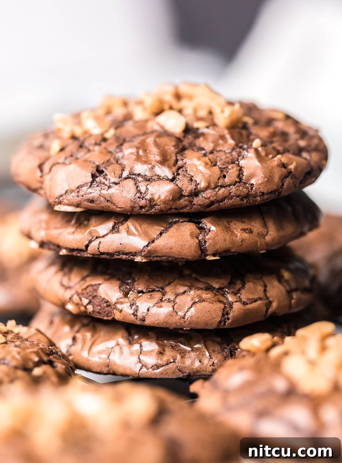 Toffee Brownie Cookies stacked on rack