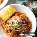 Budget friendly plate of spaghetti with meat sauce.
