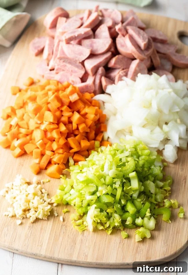sausage, carrots, onion, celery, and garlic