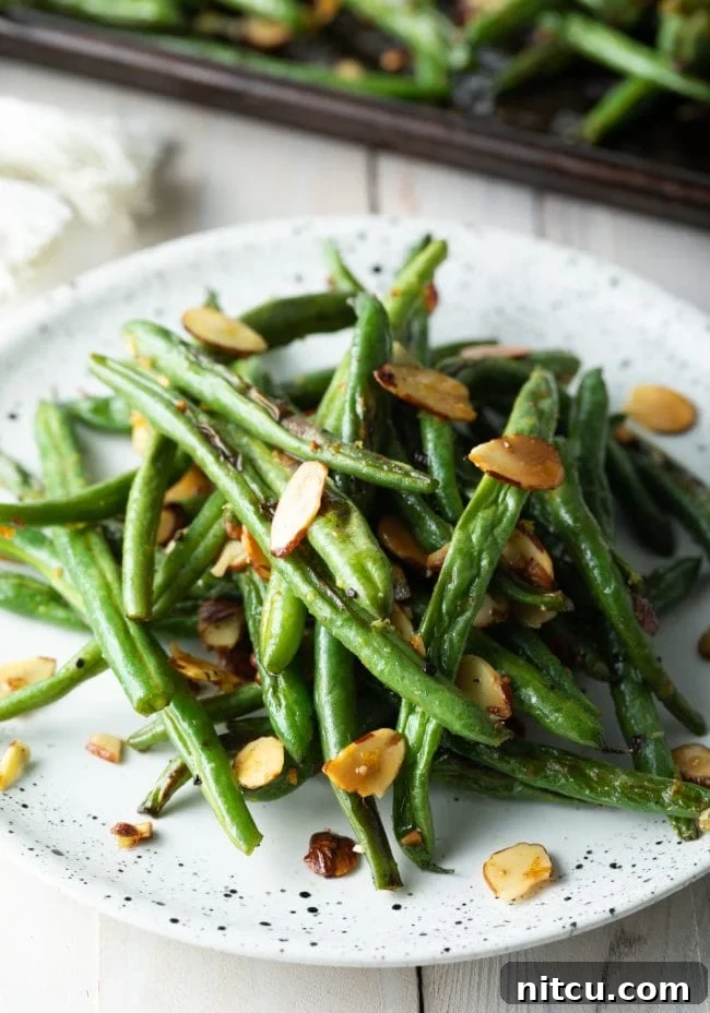 healthy green beans with almonds plated for dinner