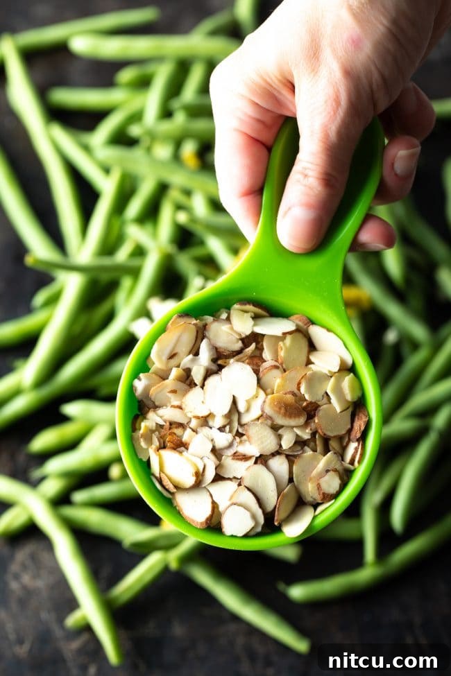 Adding almonds to the pan