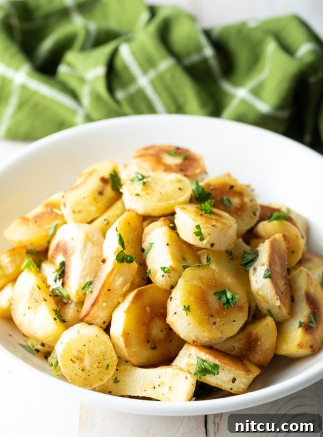 garlic butter roasted parsnip recipe in bowl