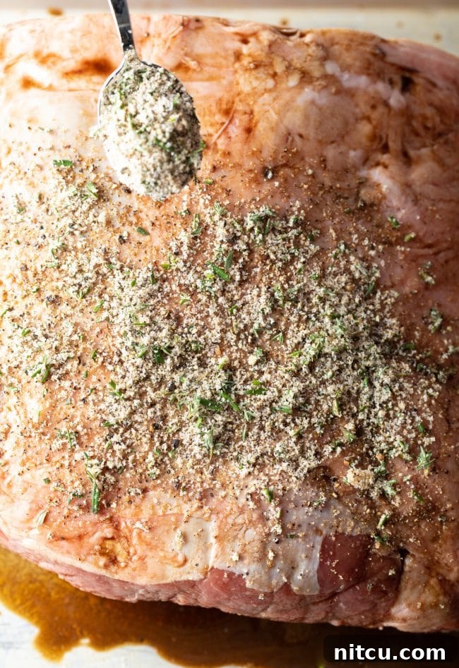 Prime rib coated with Worcestershire and seasonings, ready for the smoker