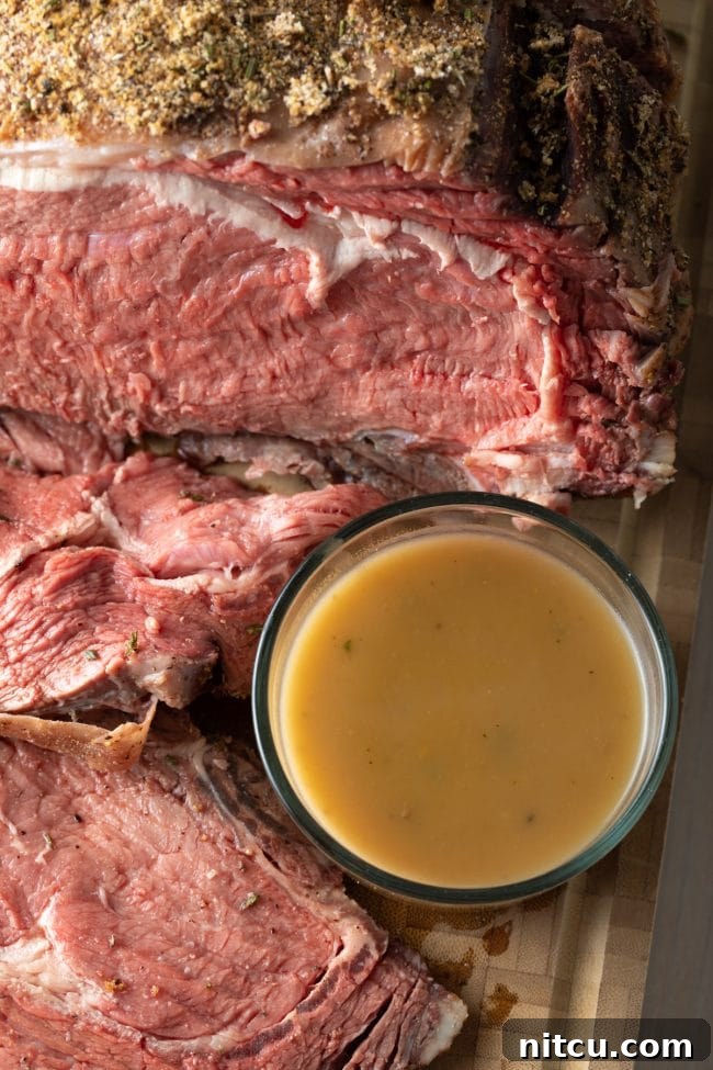 Overhead shot of finished smoked prime rib recipe with au jus