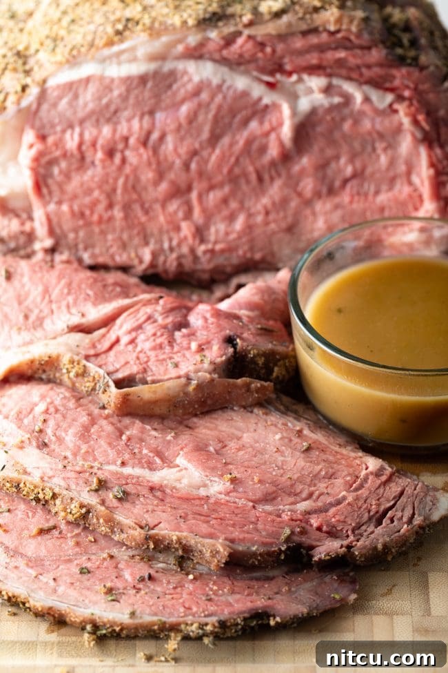 Smoked prime rib made in the smoker with a side of au jus beef gravy