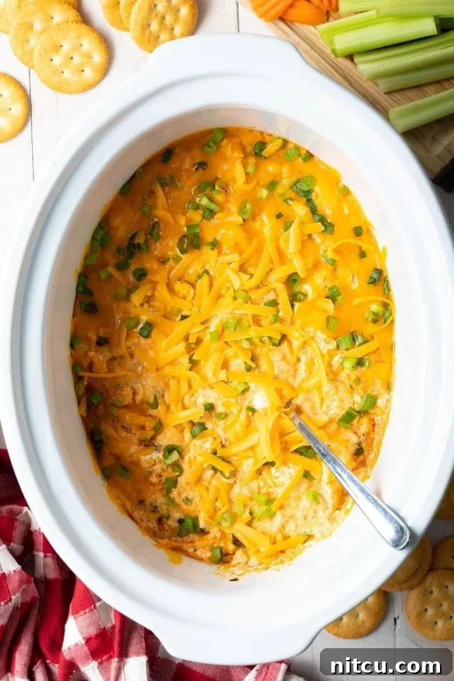 cheesy frank's redhot buffalo chicken dip in the slow cooker