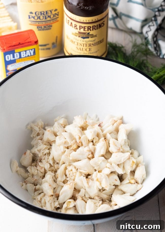 Bowl loaded with fresh crab meat.