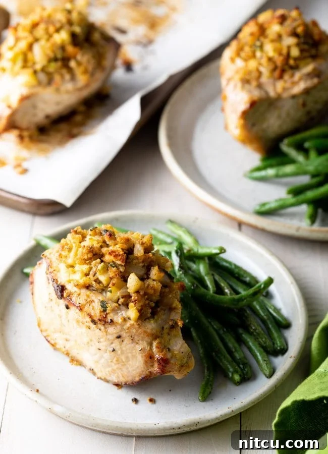 Side view of how to plate the stuffed pork with a side of green beans with it