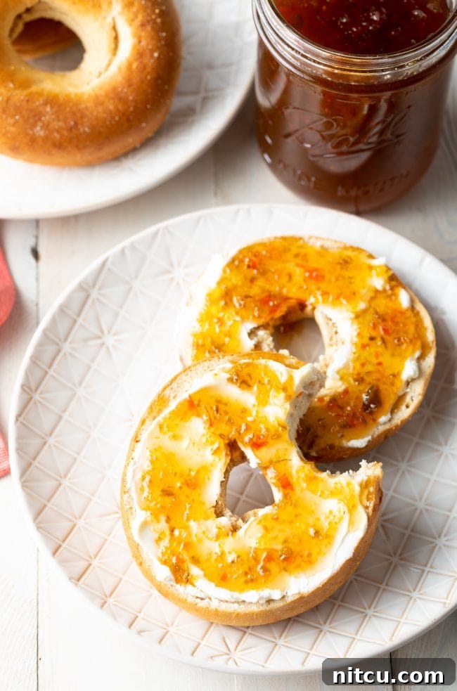 Jalapeno jelly recipe with cream cheese on bagels. A delicious breakfast.