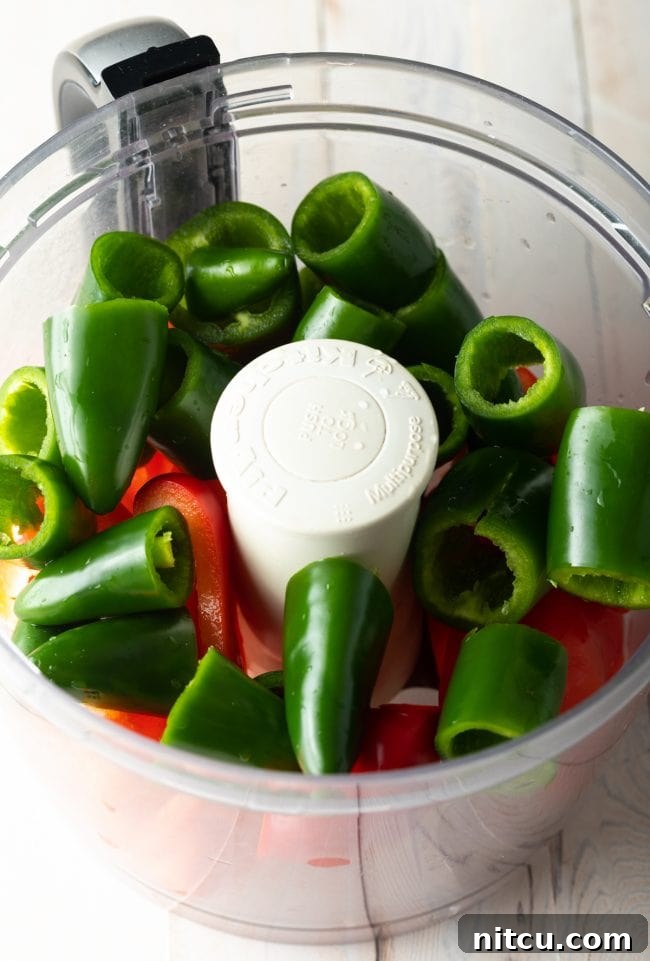 Chopped peppers in a food processor, finely minced.