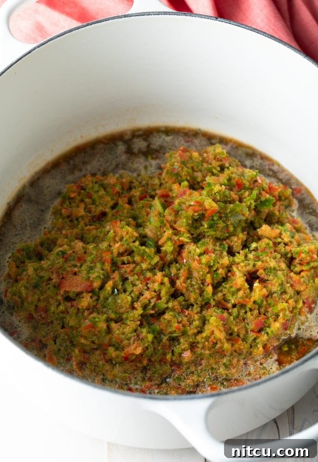 Blended peppers in a pot, ready for cooking.