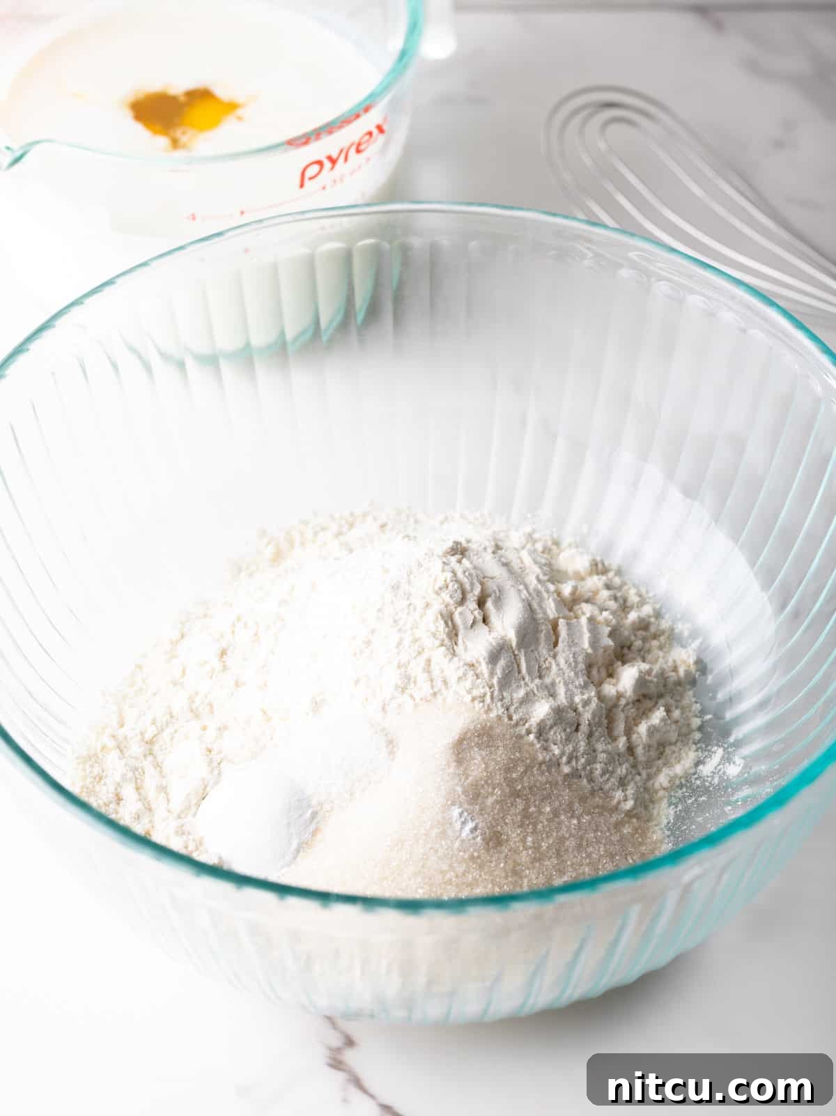 ingredient for buttermilk pancake mix in a large bowl